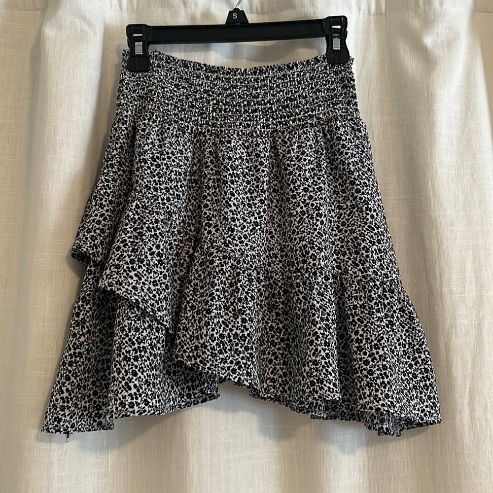 Black and white flower print skirt with a crossed ruffle from Altar’d state